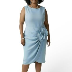 Chic Sleeveless Blue Dress with Floral Accent